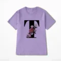 Paars dames t-shirt met korte mouwen en een stijlvolle bloemige letter T print. - 10643 / S