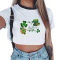 St. Patrick's Day clover print crop top detail view, showing the contrast black collar and graphic. - S / White