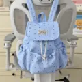 Hübscher blauer Pünktchen-Rucksack für Mädchen, stilvoller College-Tagesrucksack mit Fächern. - Schleife-Stil / Blau