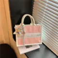Pink canvas tote bag with star pattern, white trim and shiny silver star pendant accessory. - Pink