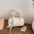 Cream white PU leather Boston handbag casual versatile crossbody bowling bag with star charm. - Off White
