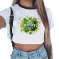 St. Patrick's Day green clover print crop top featuring contrast black trim collar and short sleeves. - S / White