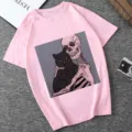 Pink short sleeve t-shirt featuring a gothic skeleton and black cat graphic print top. - S / Pink (21051)