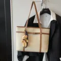 Stylish beige and brown tote bag with cute bear pendant, large capacity shoulder bag for women. - White
