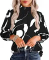 Close-up detail of the elegant black and white abstract print long sleeve blouse fabric. - Black 2