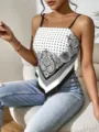 Detailed view of a black and white paisley print handkerchief camisole top for women. - Black