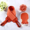 3-piece exfoliating bath set includes back scrubber strap, bath sponge, and mitt for deep cleaning. - Jujube Red 3-Piece Set