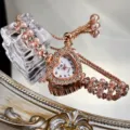 Herzförmige Strass-Quarzuhr mit doppeltem Perlen-Schiebearmband für Damen Mode. - Roségold Zifferblatt