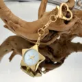 Goldfarbene Stern Taschenuhr Schlüsselanhänger Herz Verschluss Quarzuhr Tasche Deko - Goldblau
