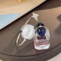 Κομψό ρολόι χαλαζία με ανοιχτό βραχιόλι και μοναδικό σχέδιο πεταλούδας από κρύσταλλο. - Στρας Ασημί