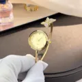 Kompso gynaikeio rologi quartz me petalouda, minimalistiko chryso vrahioli rologi. - Στρας Χρυσό