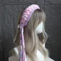 Fascia per capelli all'uncinetto fatta a mano con nappe colorate, accessorio boho per donne. - Viola chiaro