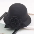 Detail view of black wool felt dome hat featuring an elegant 3D floral accent and leaf. - M (56-58cm) / Solid Large Flower - Black
