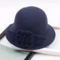 Close-up detail of dark blue felt dome hat with elegant 3d floral side decoration. - M (56-58cm) / Solid Large Flower - Navy Blue