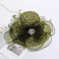 Green organza lace flat top sun hat with ruffled brim and elegant flower decoration. - Adjustable / Grass Green