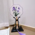 Handcrafted Chinese embroidered round fan with purple iris and tassel for Hanfu photography. - 2