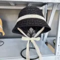 Women's summer black straw bucket hat with white lace ribbon bow, stylish beach sun hat. - Tie Bucket Hat / Black