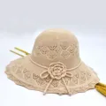 Beige knitted sun hat variant, lace brim with decorative flower, stylish summer beach wear. - Peony Hollow Knit Hat / Beige