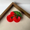 Close-up detail of cute red tomato fruit hair claw clip, creative hair accessory for women styling. - Small Tomato