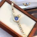 Chic heart link quartz watch with blue dial and gold tone finish, exquisite jewelry style. - Gold and Blue