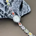 Exquisite oval quartz watch with colorful gemstone inlaid silver bracelet for women's daily use. - Silver Shell White Face