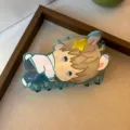 Detailed view of a cute cartoon anime character hair claw clip with rabbit ears and star decor. - Blue Cartoon Animal (6244026519998) / Blue