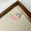 Cute acrylic bird hair claw clip detail shot, pink and blue mini hair accessories for kids. - Size 8
