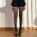 Schicke schwarze Spitzenstrumpfhose mit Lochmuster für Damen, modische Netzstrümpfe für den Alltag. - Einheitsgröße / Gebrochenes Weiß