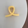 Pince à cheveux jaune croisée pour femme, accessoire élégant et pratique au quotidien. - Style Boucle Croisée / Jaune