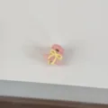 Mini pink hair claw clip with a cute yellow bow detail, perfect for side bangs and cute hairstyles. - Pink Claw - Yellow Bowknot