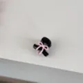 Close-up detail of a mini black hair claw clip featuring a cute pink bow, perfect for styling fringe. - Black Claw - Pink Bowknot