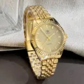 Goldene Quarzuhr mit klassischer kannelierter Lünette und Metallarmband für den Alltag. - Damenstil / Gold