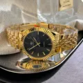 Luxus goldene Quarzuhr für Damen und Herren mit klassischer geriffelter Lünette Armband. - Herrenstil / Schwarz