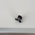 Detail shot of a cute black mini hair claw clip featuring a delicate silver bow decoration. - Regular Bow Style (10#) / Black