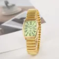 Goudkleurig dames horloge met quartz uurwerk, rekbare band en helder groen wijzerblad. - Goud Lichtgevend Heren Stijl