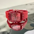 Transparente rote Tonneau Quarzuhr mit Silikonarmband und stilvollem Zifferblatt für Alltag. - Rot
