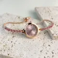 Exquisite rose gold quartz watch with pink crystal tennis bracelet strap and elegant dial. - Pink