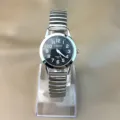 Lässige Quarzuhr mit schwarzem Zifferblatt und dehnbarem Metallarmband für Alltag. - Damenstil / Silbernes Band Schwarzes Zifferblatt