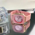 Elegant pink square dial quartz watch with soft silicone strap for women daily wear. - Pink