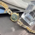 Edle Damen-Quarzuhr mit Strass, grünem Sternenhimmel-Zifferblatt und goldenem Armband. - Gold Grün