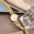 Elegante Damen Quarzuhr Armbanduhr mit funkelnden Strasssteinen, luxuriöses goldenes Design. - Gold Weiß