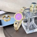Elegante Damen Quarzarmbanduhr mit lila Glitzerzifferblatt und Strass-Goldgliedern. - Gold Violett