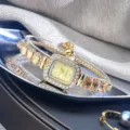 Elegant rhinestone square quartz watch with crystal bracelet design, exquisite detail view. - Gold