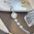 Silber Strass Damen Armbanduhr elegante Blumen Zifferblatt Quarz Mode Armbanduhr - Silber