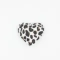 Close-up detail of the cute heart-shaped leopard print bag charm with soft texture. - White Heart