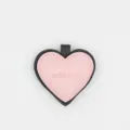 Detailed close-up of the stylish pink and black heart leather keychain and cute bag pendant. - Heart Style / Pink