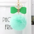 Green faux fur pom pom keychain with leather bow and rhinestone metal hardware for bags. - 8cm Pompom / Mint Green