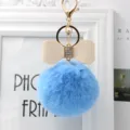 Blue fluffy pom pom keychain with chic bow and rhinestones, perfect bag charm accessory. - 8cm Pompom / Sky Blue