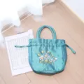 Traditional Chinese style silk embroidered handbag with delicate drawstring design for Hanfu. - Teal