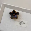 Molla per capelli a fiore ambrata, elegante accessorio in acetato per acconciatura donna. - Piccolo-Fiore Nero